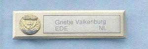 Goudkleurige naambadges